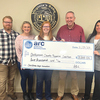 John Wilson and Amanda Hall of Addiction Recovery Care, which is building a rehabilitation facility on Red Onion Mountain, recently donated funds to support Dickenson County Partners for Prevention.  PROVIDED BY COUNTY