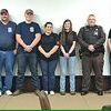 County supervisors pose Dec. 28 with first responders honored for a November rescue.  LARRY BARTON PHOTO