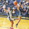 Braelynn Strouth sneaks by the Abingdon defender for an open look at the basket. PHOTO BY ASHLEY HILL